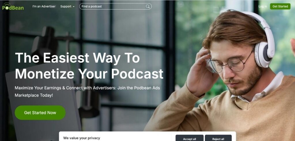 Podbean homepage hero with the headline 'The Easiest Way To Monetize Your Podcast,' a Get Started Now button, and a photo of a man adjusting his white headphones while seated near recording equipment.
